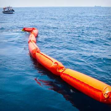 inflatable containment boom foam filled at sea