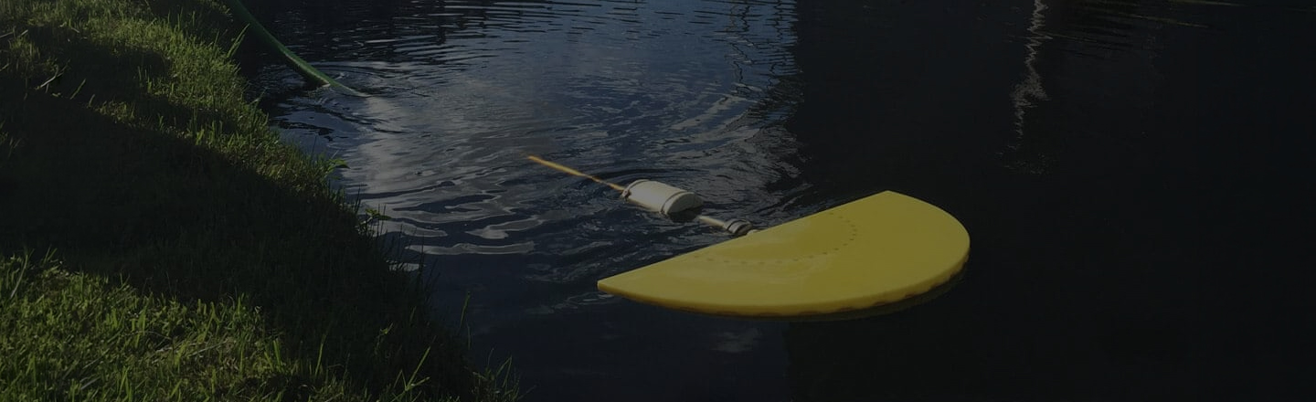 Suction skimmer floating in water